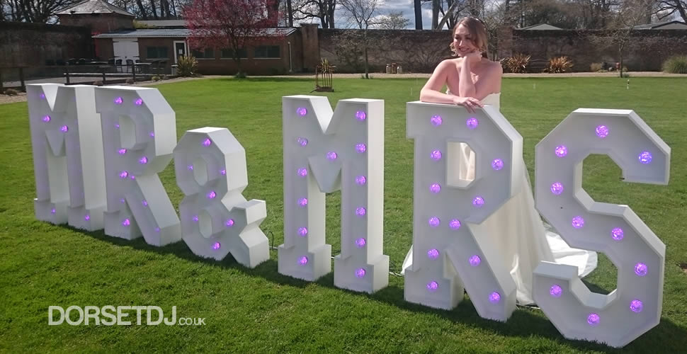 MR and MRS outside lawn marquee letters LED white pink