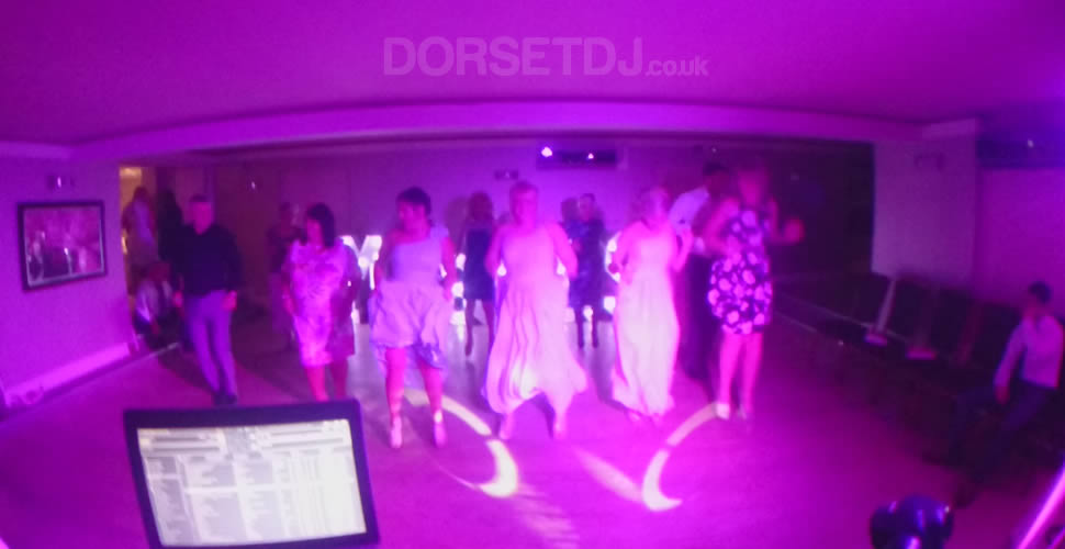 Party time with dancers for Dorset DJ wedding Disco at the Christchurch Harbour Hotel